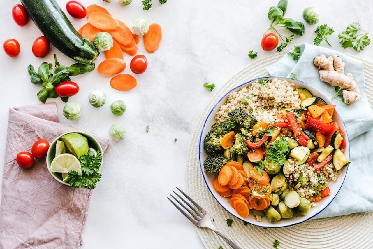 Source: Ella Olsson - pexels - Colorful quinoa salad with fresh vegetables creates a healthy, balanced meal.