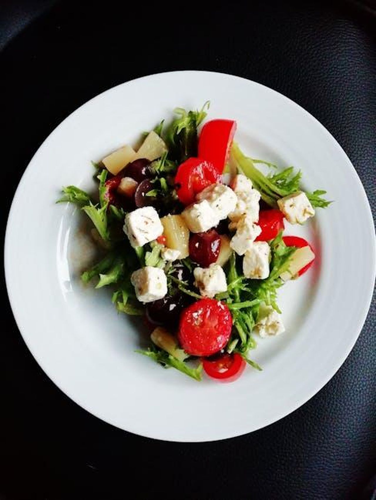 Source: Iina Luoto - pexels - Delicious Greek salad featuring fresh vegetables and creamy feta cheese, perfect for a healthy meal.