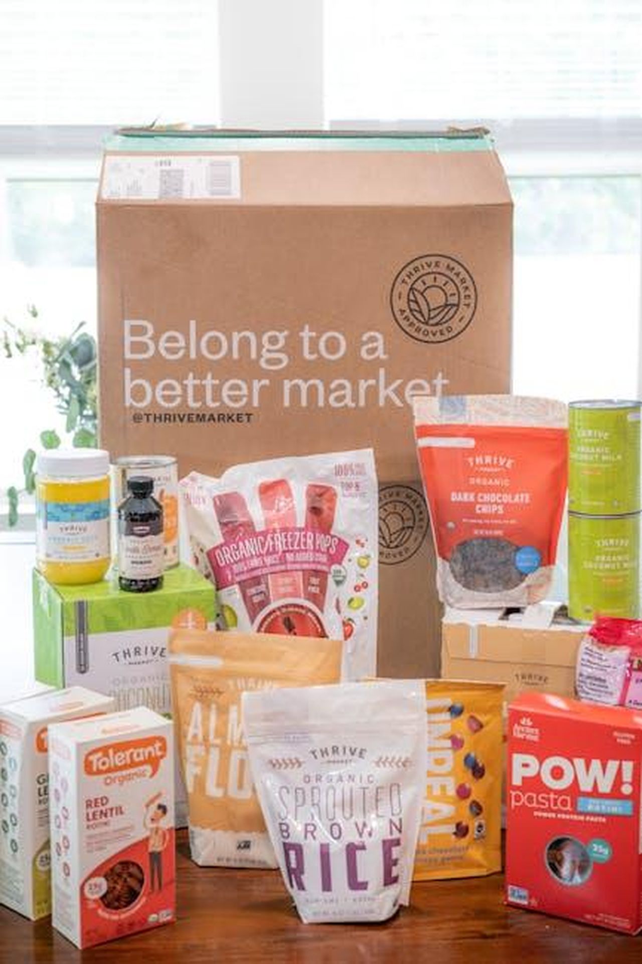 Source: Connor McManus - pexels - Assorted Thrive Market organic food products in packaging, indoors display.