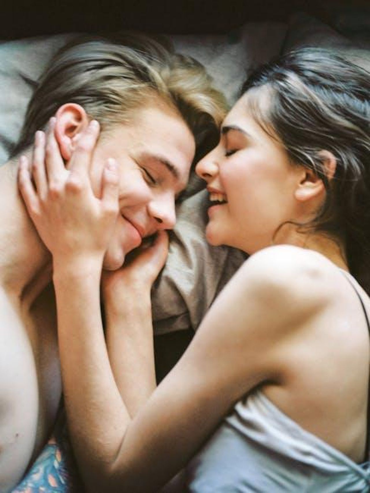 Source: Pixabay - pexels - A joyful and intimate moment of a young couple embracing and smiling together.